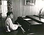 Photograph of Glenn Gould playing the piano, early 1950s
